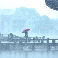 冬天杭州西湖雪花纷飞风景QQ头像图片