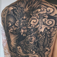 手臂纹身,日式大般若纹身,鲤鱼纹身,关公纹身,黑灰莲花纹身